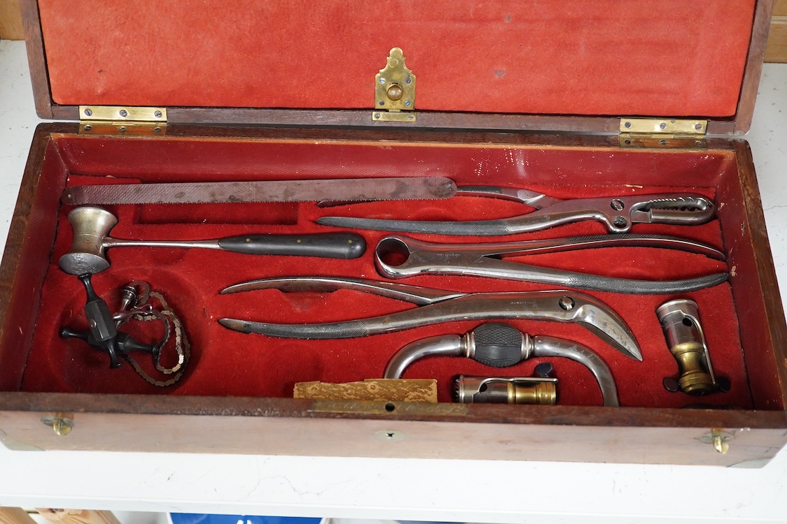 A 19th century surgeon’s set by Collin & Cil., Paris, in a fitted mahogany case, comprising of steel surgeons instruments; knives, scalpels, scoops, tourniquet, saws, rasps, some instruments stamped with maker’s name, wi